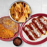 Pick  1  : 4 Pack Of Enchiladas Or Tacos (Feeds 2 Or More) · comes with 1/2 pint of rice & 1/2 pint of beans , 1 bag of chips and 1/2 pint salsa
Enchilad...