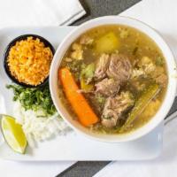 Caldo De Res Soup · Beef and vegetable soup served with rice.