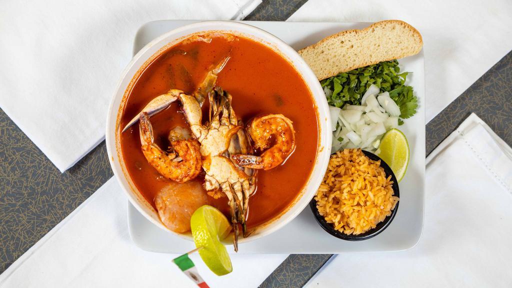 Caldo De Mariscos · Shrimp, octopus, tilapia, and crab soup. Served with rice and bread.