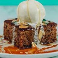 Sticky Toffee Pudding · Served warm with candied pecans, buttery caramel sauce, bourbon crème anglaise, vanilla bean...