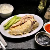 Hainanese Chicken Rice · Chicken prepared in accordance with traditional Hainanese methods, which involve poaching th...