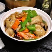 Tofu Delight · Deep-fried soft tofu stir-fried with mushrooms, snow peas, Chinese cabbage, and carrot in oy...
