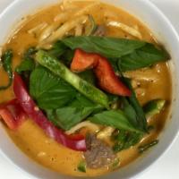 Red Curry · bamboo shoots, basil, bell peppers, green beans, red curry paste, coconut milk (serve with s...