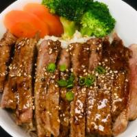 Steak Teriyaki · Steak with teriyaki sauce and vegetable.