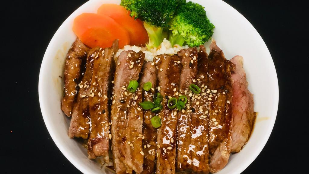 Steak Teriyaki · Steak with teriyaki sauce and vegetable.