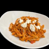 Penne Alla Vodka · A Sauce consisting of Tomatoes, Vodka, and Heavy Cream with Fettucine Noodles. Topped with R...