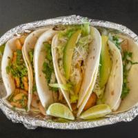 Signature Taco Platter
 · Two signature tacos served with rice, beans and a drink.
