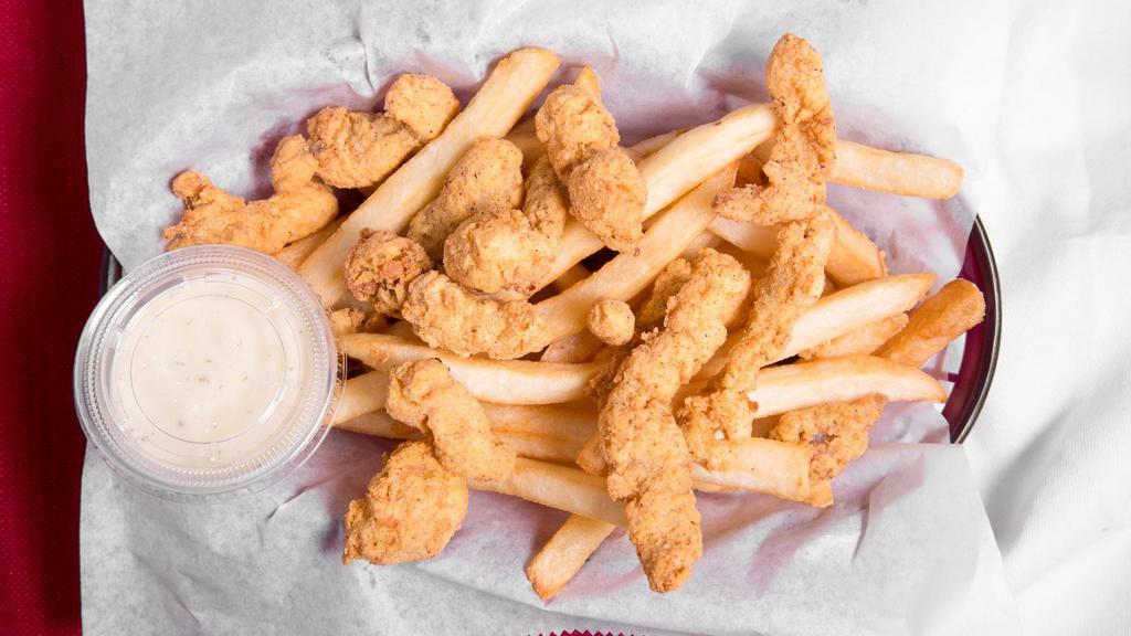 Fried Gator · pieces of gator meat fried to perfection with a crispy battered outside layer. with a side of golden french fries