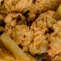 Fried Oyster Platter (10 Pieces) · juicy oysters lightly battered seasoned and fried with a side of french fries and tangy tart...