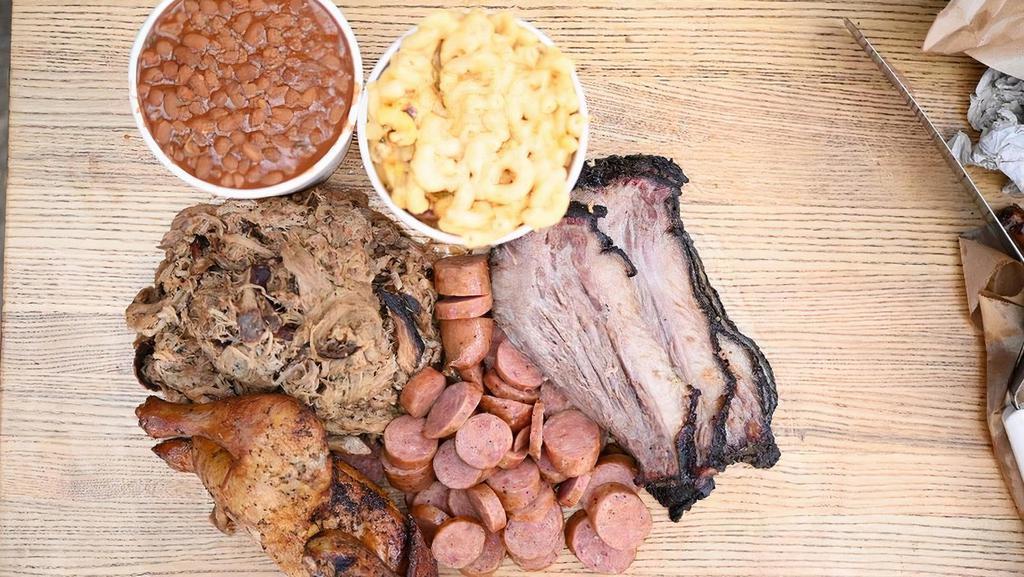 Family Affair (Feeds 4-6) · 1 lb of Sliced Brisket, 1 lb of Pulled Pork, 1 lb of Sausage (Pork & Beef or Jalapeno Beef), Half Chicken and choice of 2 XL Sides with homemade BBQ Sauce