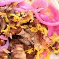 Burnt End Taco · Chopped Smoked Burnt Ends, pickled onion, cilantro, cheddar cheese,  with choice of homemade...