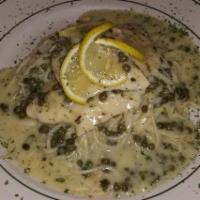 Chicken Piccata · Sautéed with capers in a white wine lemon butter sauce over spaghetti.
