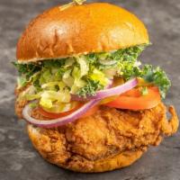 The Big Bird · Roots original chicken sandwich. Sweet potato bun, seasonal kale salad, pickles & tomatoes, ...