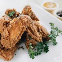 Chicken Nuggets · 10 pc Duck fat fried chicken nuggets with one dipping sauce
