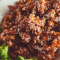 Sesame Chicken · Scrumptious strips of all white-meat chicken coated in garlic crumb, fried crispy, then toss...