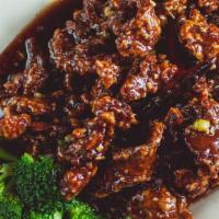 Chef'S Tangy Spicy Orange Beef · Hot & spicy. We will try to alter degree of heat to your taste. Lightly battered slices of b...
