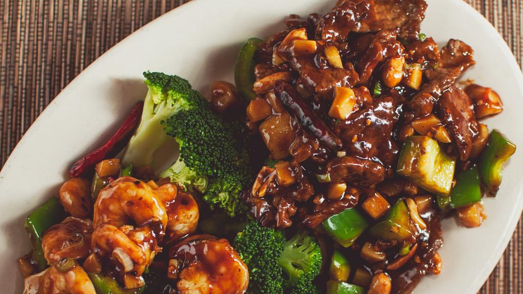 Kung Pao Surf & Turf · Hot & spicy. We will try to alter degree of heat to your taste. A showdown of epic kung pao proportions: beef & shrimp. The only thing standing in between them are the steamed broccoli florets.