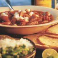 Menudo · A regional favorite! Served in the traditional style with Lemon Wedges, Chopped Onions, Pepp...