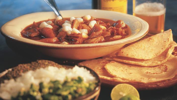 Menudo · A regional favorite! Served in the traditional style with Lemon Wedges, Chopped Onions, Peppers and Tortillas