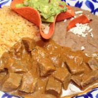 Rancho Special · A Mi Tierra Specialty! Succulent Beef Tips simmered in Pepper, Onion and Tomato Sauce [or] P...