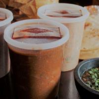 Tex-Mex Classic Package #1 (Serves 4- 5) · Choice of carne guisada or carne de puerco en chile cascabel, pint of salsa molcajete, famil...