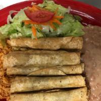12-Flautas With Rice And Beans · 12-Flautas with Rice and Beans and a Side Salad. 
12-Flautas con Arroz, Frijoles y Ensalada.