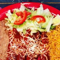 Enchiladas With Rice And Beans · 4-Cheese Red Enchiladas served with Rice, Beans with a side salad.  Enchiladas Rojas de ques...
