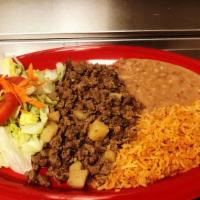 Chile Verde / Green Chile · DIsh of green chili with rice and beans, a side salad and tortillas. Plato de chile verde, c...