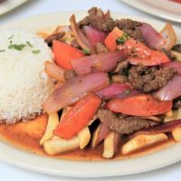 Lomo Saltado · Most popular. Stir-fried beef with sautéed tomatoes and onions served with fries and rice.