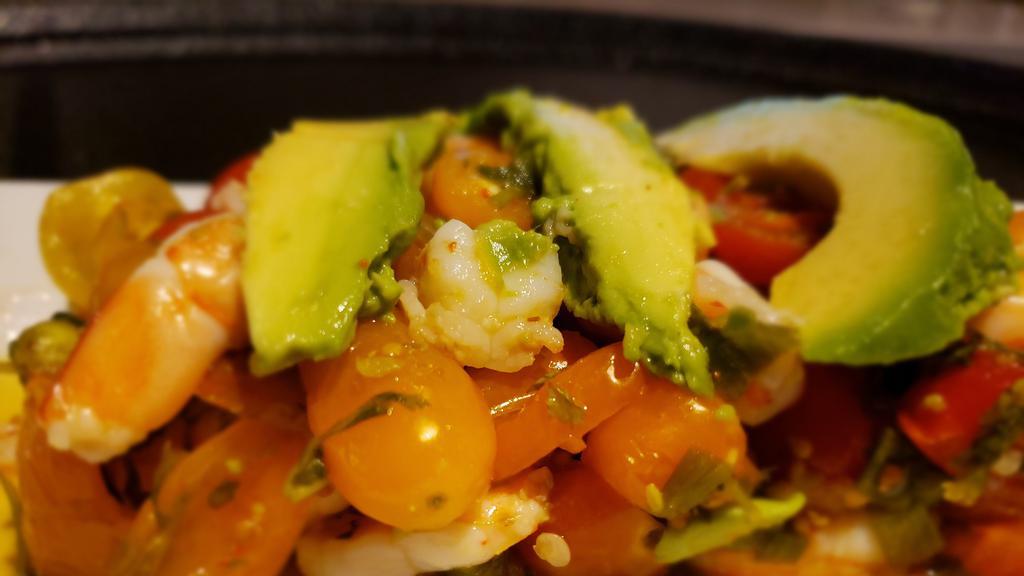 Ceviche · Shrimp, avocado, jalapenos, heirloom grape tomatoes, green onion, cilantro and fresh lime juice.