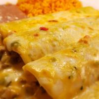 Enchiladas Calientes · Three enchiladas topped with our spicy chile queso sauce and jack cheese with your choice of...
