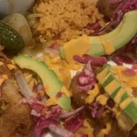 Camarones Baja Tacos · Three negra modelo beer battered jumbo shrimp tacos with pickled cabbage, avocado, and volca...