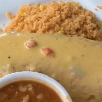 Chimichanga · Choice of meat. Large flour tortilla stuffed with meat, peppers, onions, and cheese then fri...