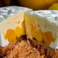 Mango Cheesecake · Creamy cheesecake with mango. Contain: mango, cream cheese.