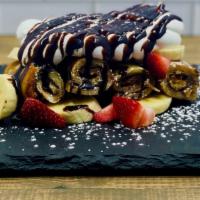 Berry-Nutella Roll Ups · Caramelized banana cream cheese.