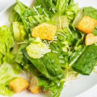 Caesar Salad · Romaine lettuce with shaved parmesan and homemade croutons with a homemade Caesar dressing