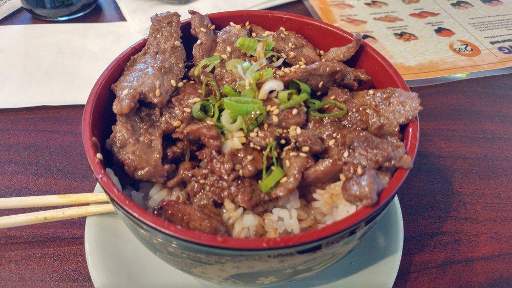 Beef Bulgogi Bowl · Grilled beef on bowl of rice.