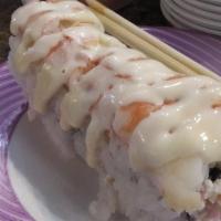 Texas Rolls (4 Pieces) · Cream cheese and crab salad rolls with shrimp on top, creamy sauce.
