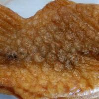 Taiyaki · Fish shaped deep fried wheat cake filled with sweet red beans.