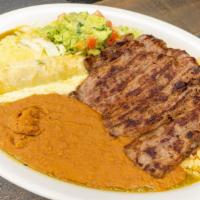 Tampiqueña Plate · Roast beef, (1) green chicken enchilada, rice, refried beans, or charros. Served with guacam...