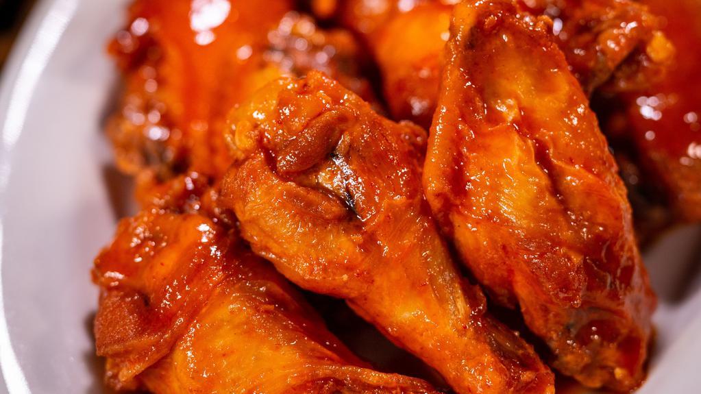 Chicken Wings · Deep fried wing tossed with your choice of house made sauces with a side of our in-house ranch.
6Pc - 1 choice of sauce/2 Ranch cups (1st selected)
12 pc - 2  choices of sauce/ 3 Ranch cups