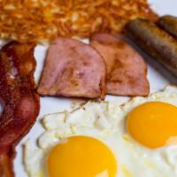 Big Time Breakfast · Two Eggs any style, 2 bacon, 2 sausage links, 2 slices of ham, 2 french toast triangles (alm...