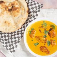 Butter Chicken · boneless chicken grilled and cooked with buttery curry.