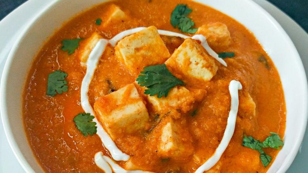 Butter Paneer · A rich tomato and cashew based gravy with butter fried paneer(cottage cheese) chunks. People eat with chapati naan or rice.