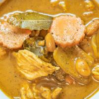 Chicken Massaman Curry · Fusion Thai and Indian inspired red Massaman curry simmer with chicken, creamy coconut
milk,...