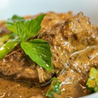 Roasted Chuck Beef Panag Curry · House special slow cooked chucks of beef in hot and Spicy red Panang curry simmer in
creamy ...