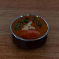 Kaju Curry ( R )  ( J )  ( S ) · Cashew nuts cooked in spicy enriched creamy tomato gravy.