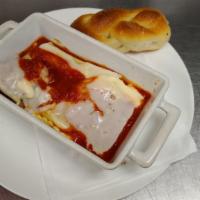 Pasta Sampler · Beef lasagna, chicken cannelloni and ravioli baked with tomato sauce and mozzarella cheese.