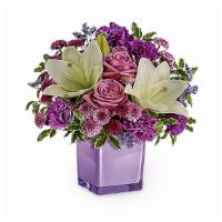 Teleflora'S Pleasing Purple Bouquet · These luxurious lavender roses and crisp white lilies are poised to please! Perfectly presen...