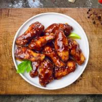 Bbq Sizzle Wings · Fresh chicken wings breaded, fried until golden brown, and tossed in barbecue sauce. Served ...